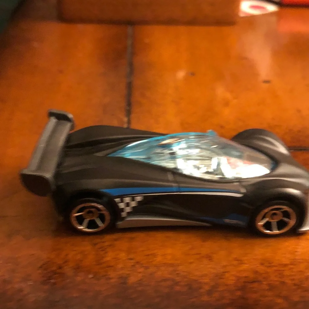 Black Toy Race Car with Blue Windshield